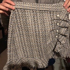 New Tweed mini skirt with pearl buttons. Adorable!